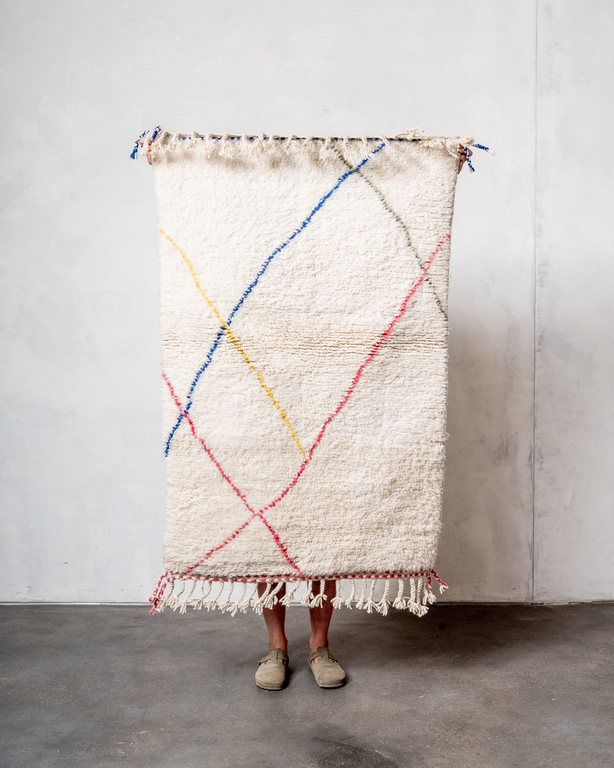 Modern, designer, handcrafted Berber rug from Morocco. Beniourain carpet with beautiful colours and patterns and fluffy wool texture.